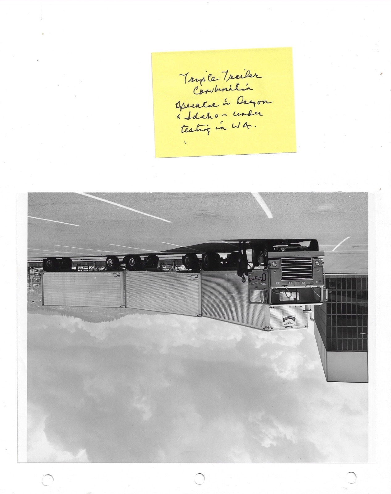 A triple-trailer rig coupled with Silver Eagle dollies